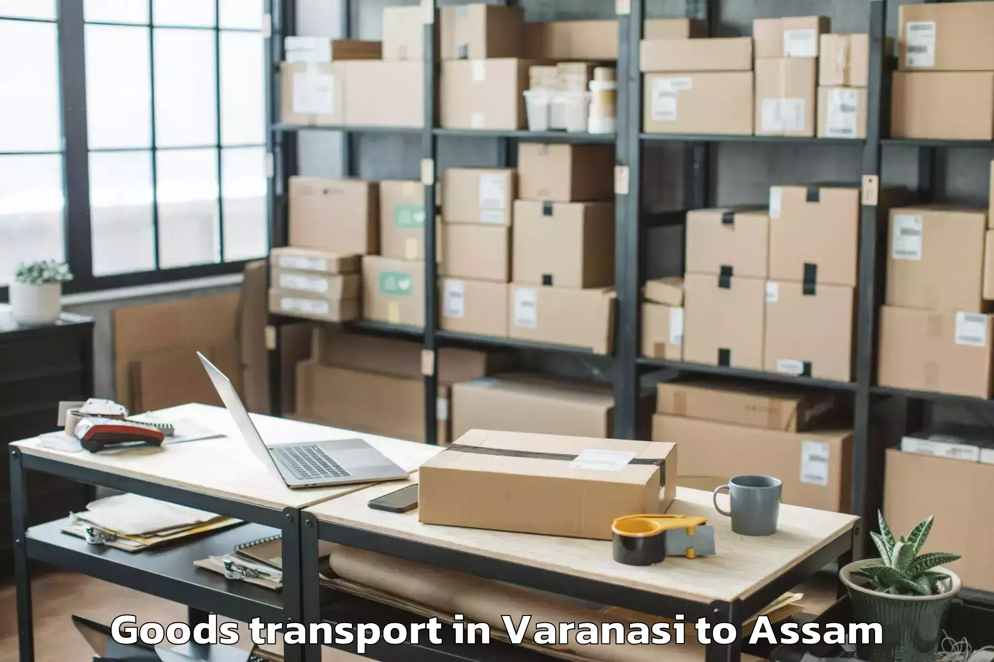 Book Your Varanasi to Marigaon Goods Transport Today